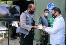 Tim KIE Dinas Kominfo Banjar susun buku saku berisi tentang Covid-19 dalam bahasa Banjar