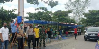 Gugus Tugas Covid-19 Tamban, lakukan pengecekan suhu tubuh terhadap warga dan pengunjung pasar tradisional