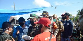 Satgas penanganan Covid 19 Batola lakukan sosialisasi Perbup 54/2020 di Pasar Belawang