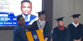 Noripansyah, raih gelar doktor dengan prediksi cum laude, usai memaparkan disertasi soal covid 19