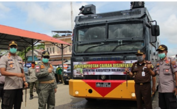 Tangkal penyebaran virus Koron, Bupati Balangan bersama forkopimdalakukan penyemprotan disinfektan secara massal