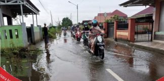 Ruas jalan sering terendam air, warga Melayu Ilir menunggu peningkatan infrastruktur dari pemerintah daerah